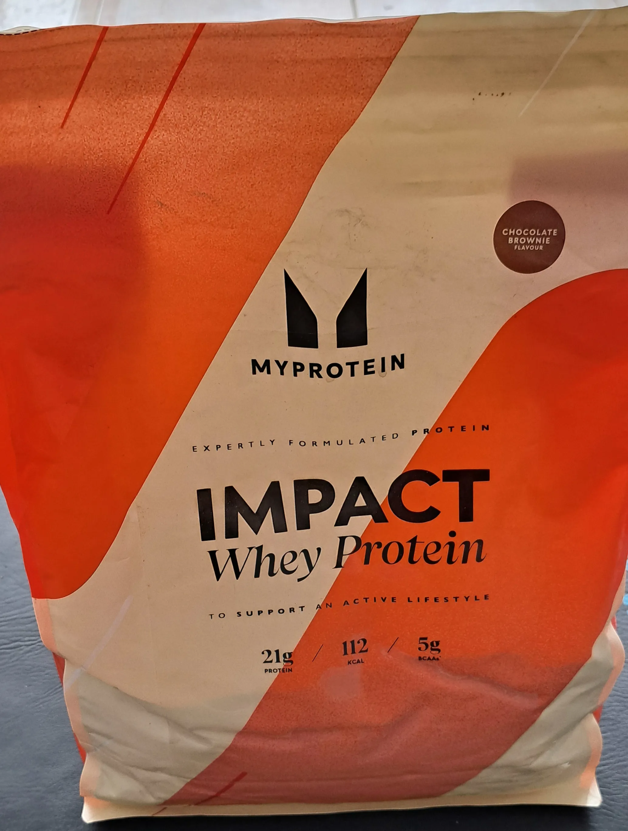 Impact whey protein packaging front